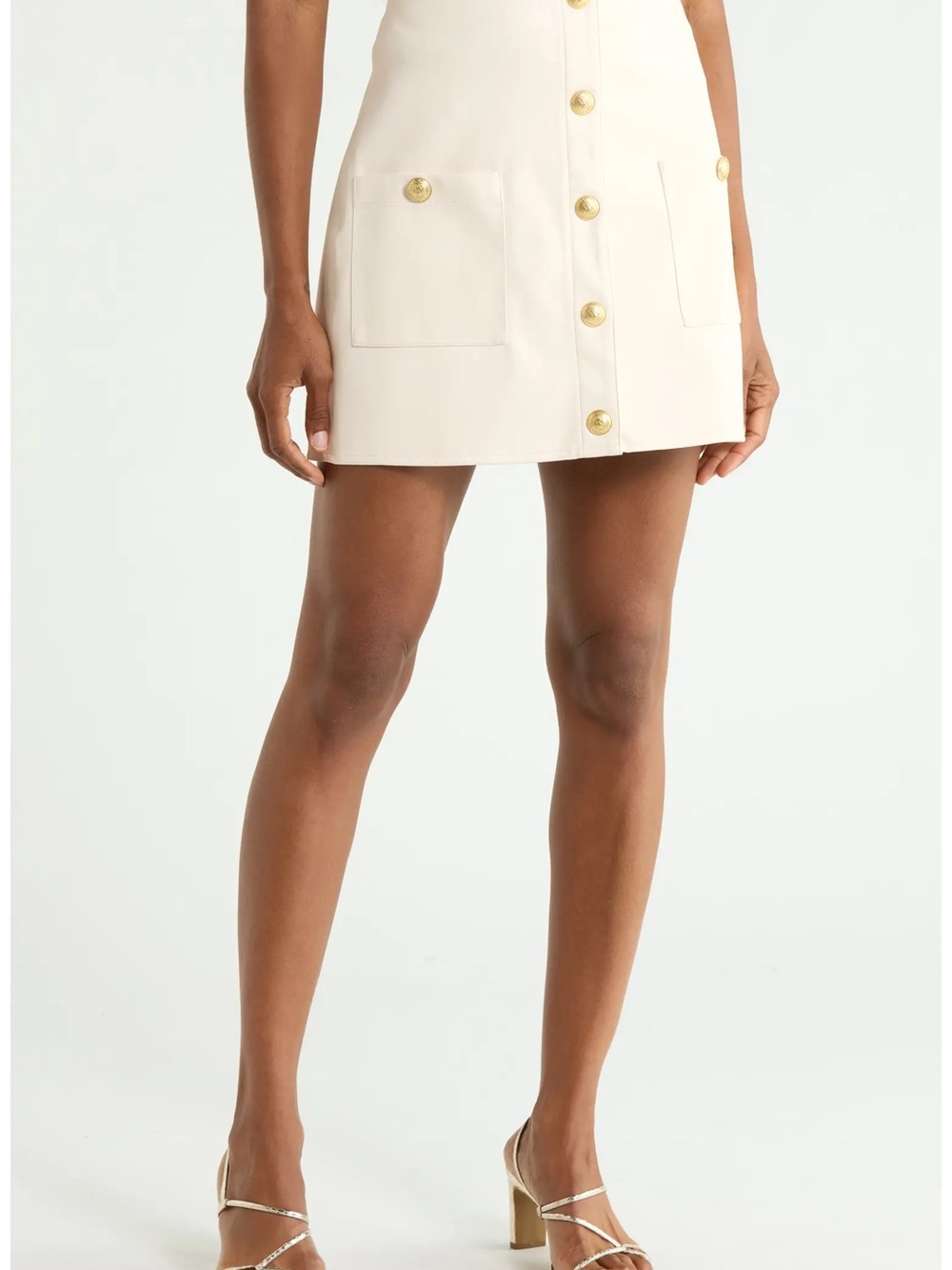 L'AGENCE Truman Snap Faux Leather Miniskirt
Button-Front Cream Mini Skirt